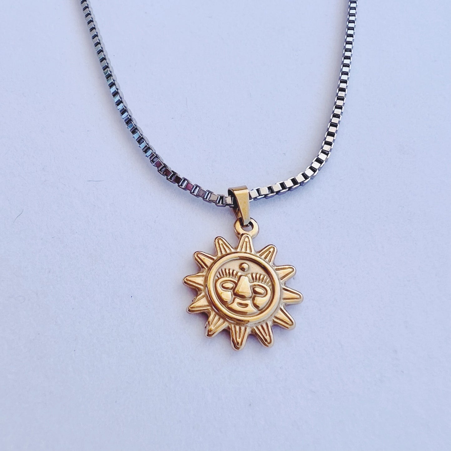 Sun Charm on Rhodium Chain
